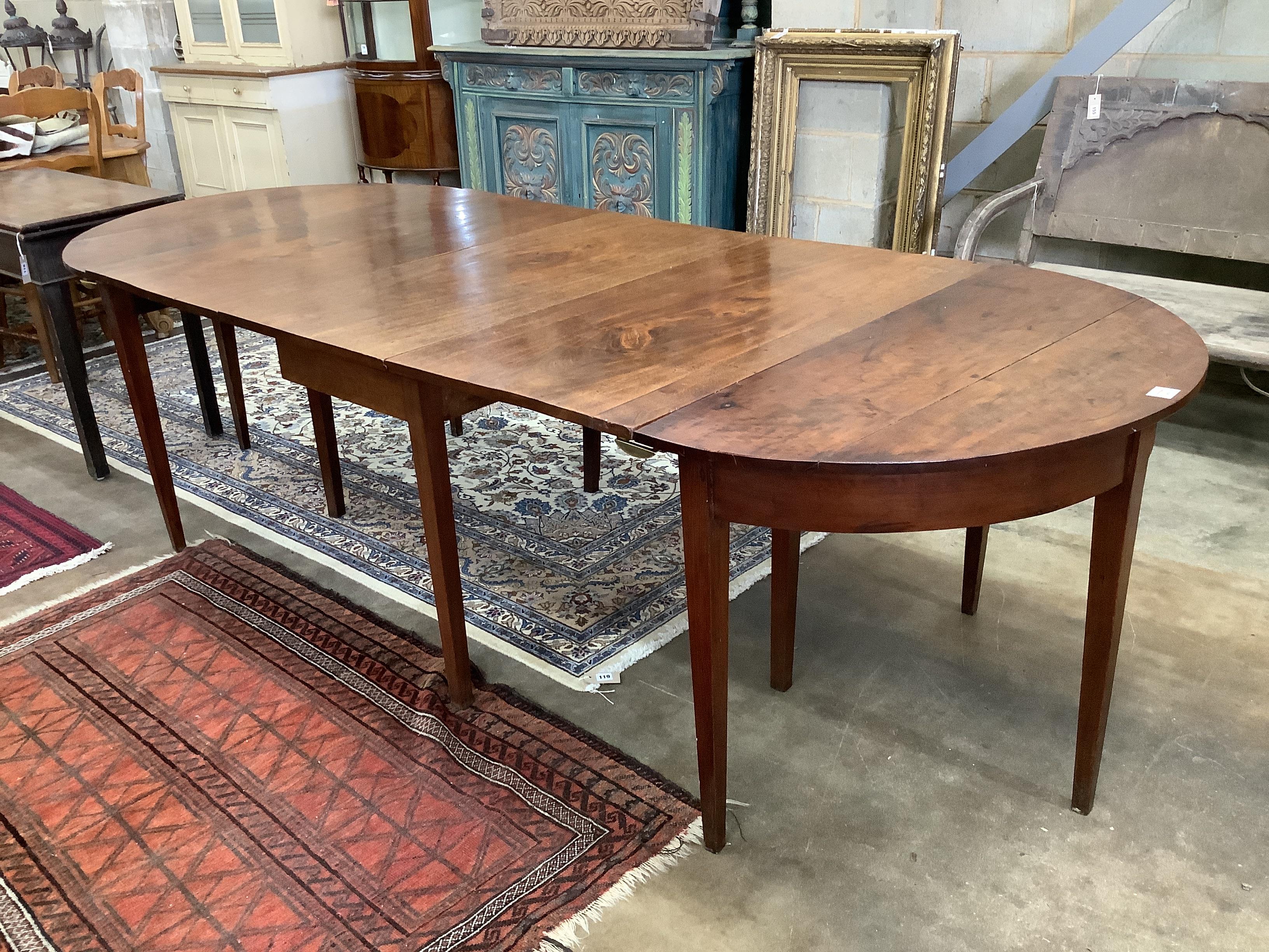 A George III mahogany D end extending dining table, width 260cm, depth 107cm, height 73cm